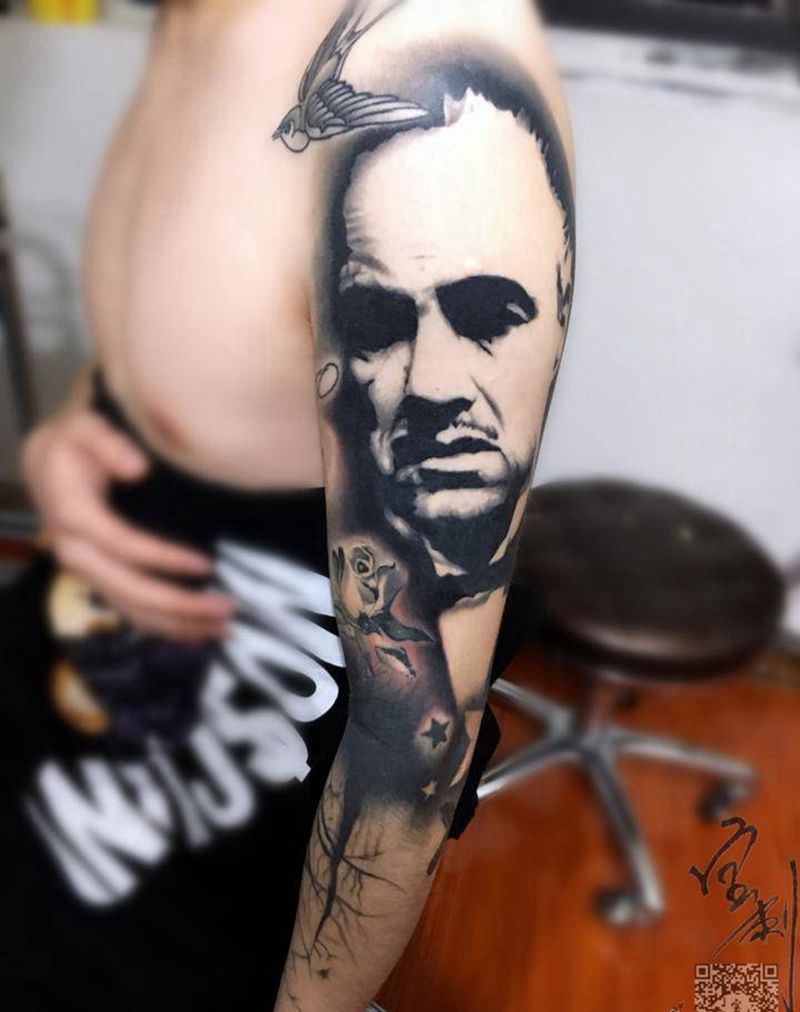 教父纹身图片_手臂肩部欧美写实教父肖像纹身图案