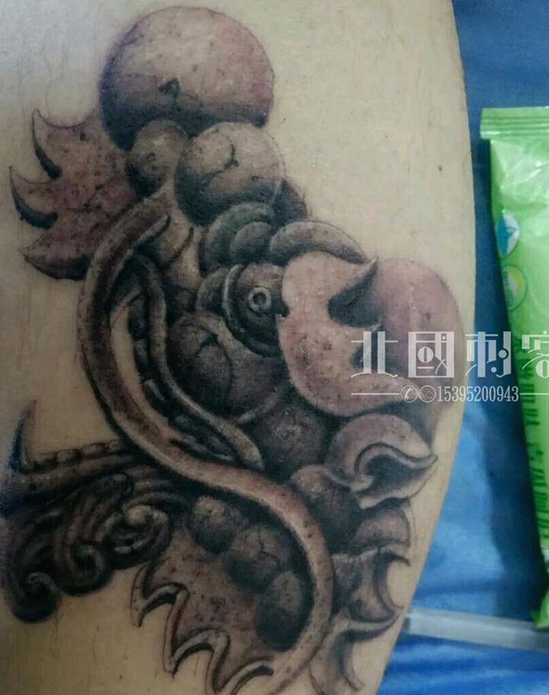 雕龙纹身图片_腿部新传统老传统龙纹身图案