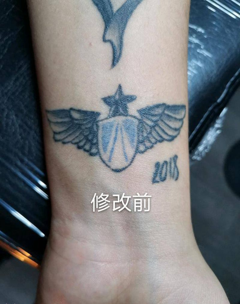 翻新旧纹身纹身图片_手臂几何点刺空军标志空军纹身图案
