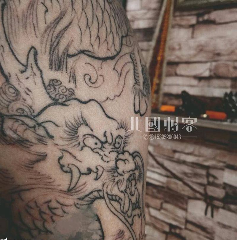 麒麟纹身图片_手臂新传统纹身图案