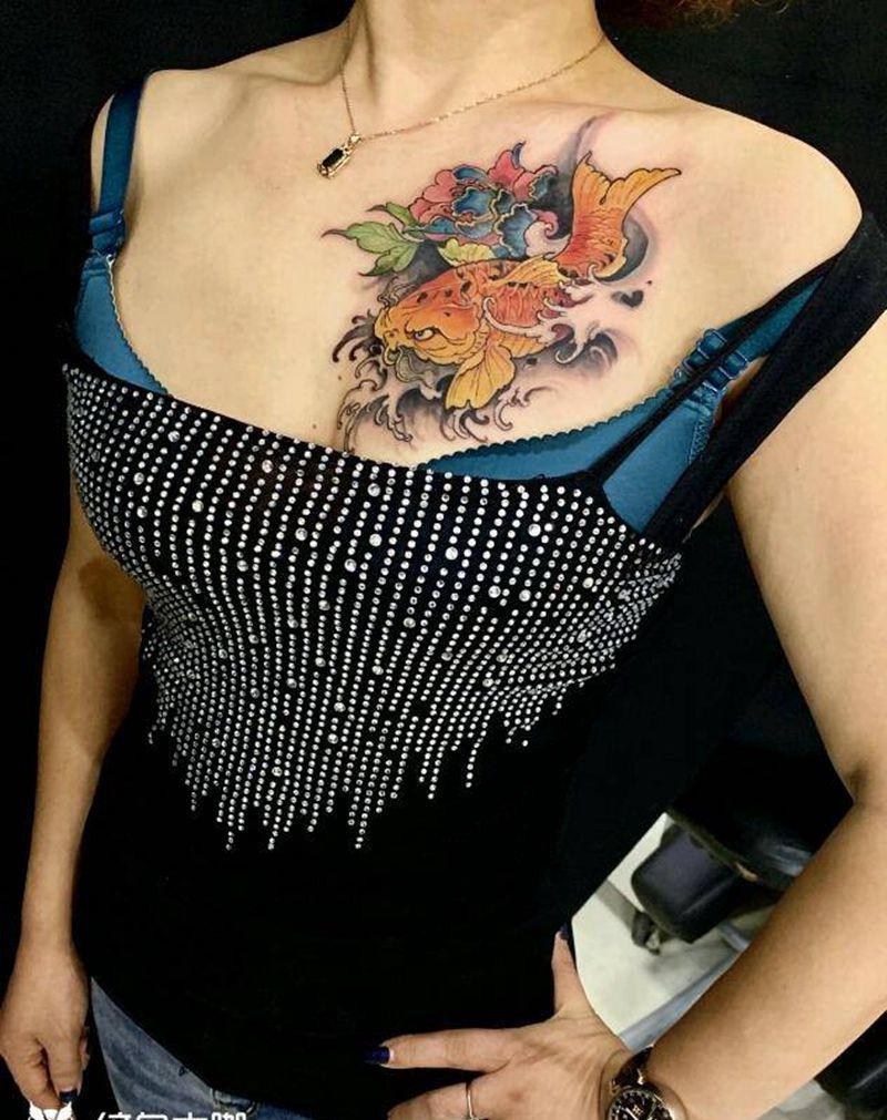 遮盖作品~鱼纹身图片_胸部新传统纹身图案