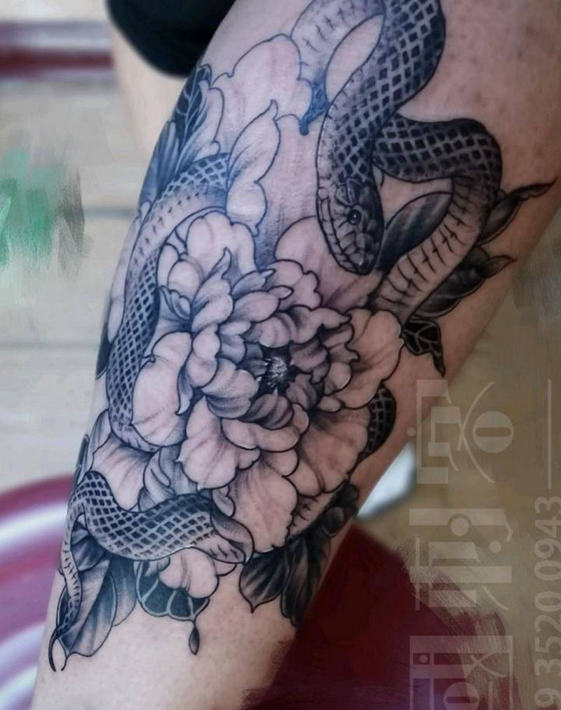 素花蛇纹身图片_手臂腿部点刺几何素花蛇纹身图案