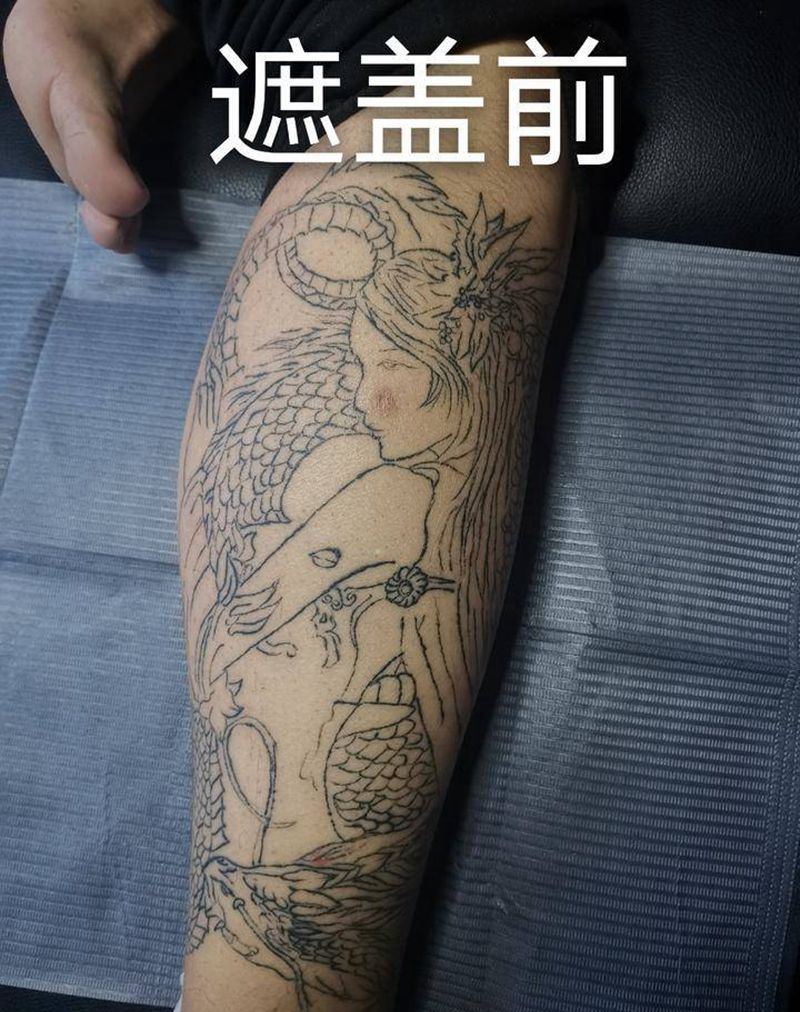 修改毁皮纹身纹身图片_腿部新传统点刺龙妓纹身图案