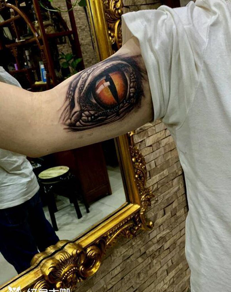 龙之眼纹身图片_手臂欧美写实纹身图案