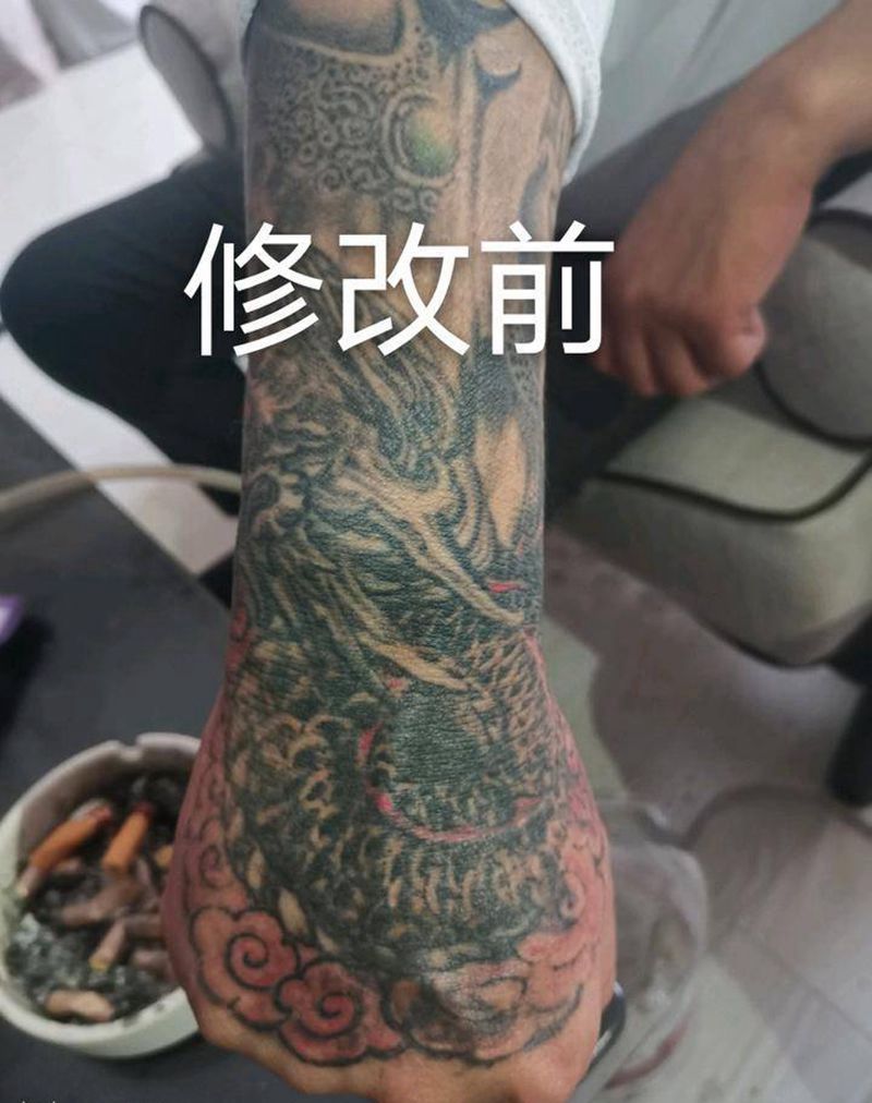 修改世纪大毁皮纹身图片_手部新传统龙云纹身图案
