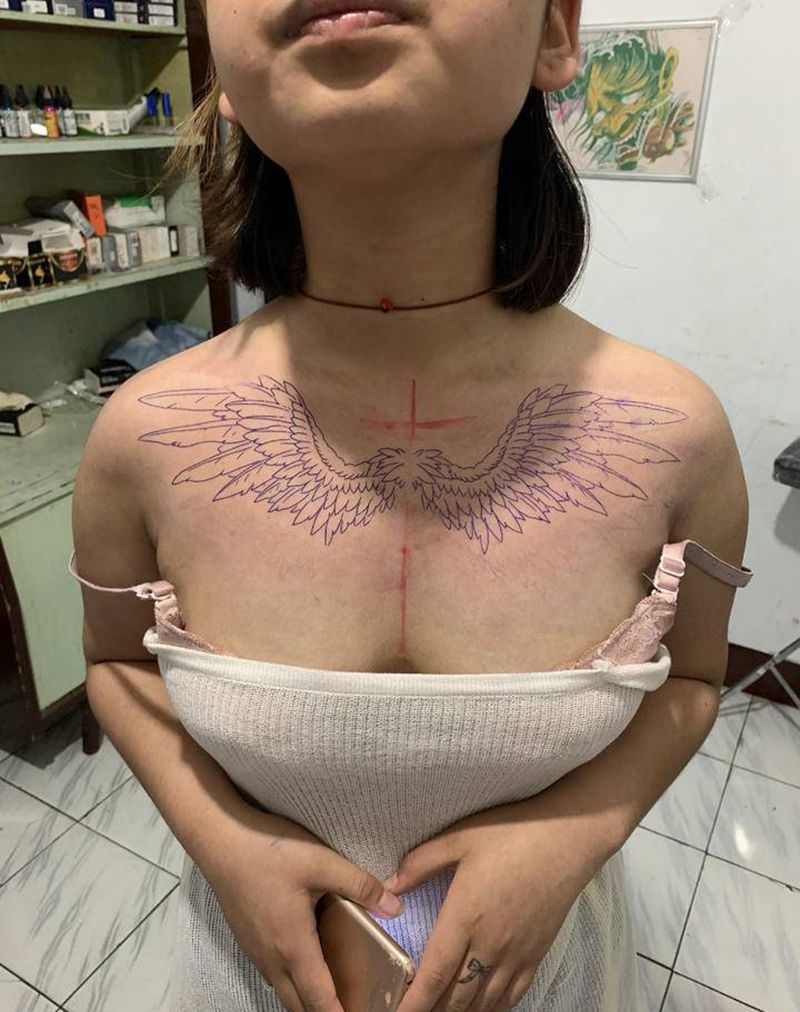 翅膀纹身图片_腹部胸部欧美写实新传统纹身图案