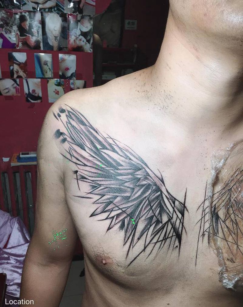 翅膀花胸纹身图片_胸部新传统纹身图案