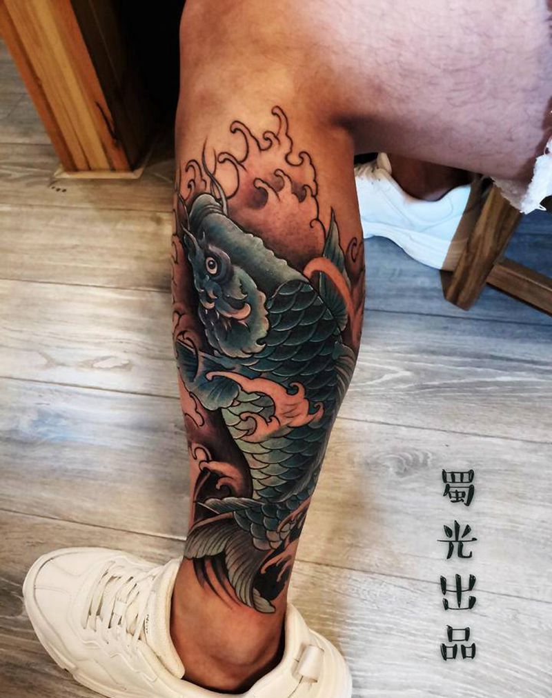 鱼纹身图片_腿部纹身图案