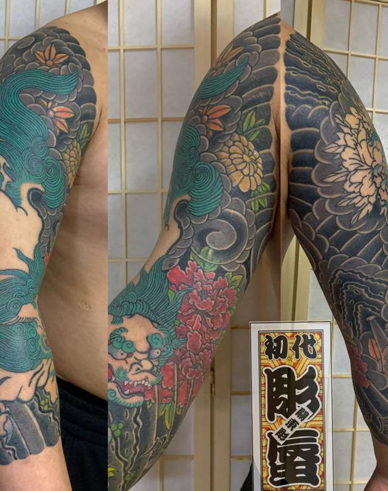 七分袖-唐狮牡丹纹身图片_手臂老传统纹身图案