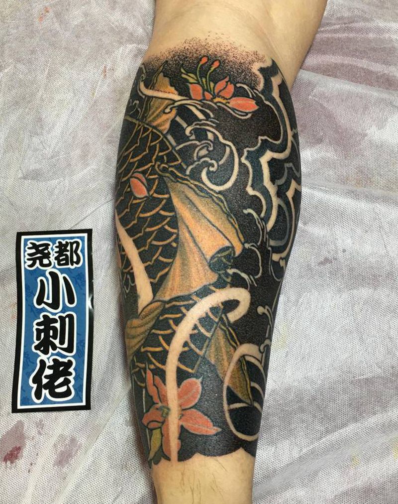 修改老鱼纹身图片_腿部老传统新传统鲤鱼浪花纹身图案