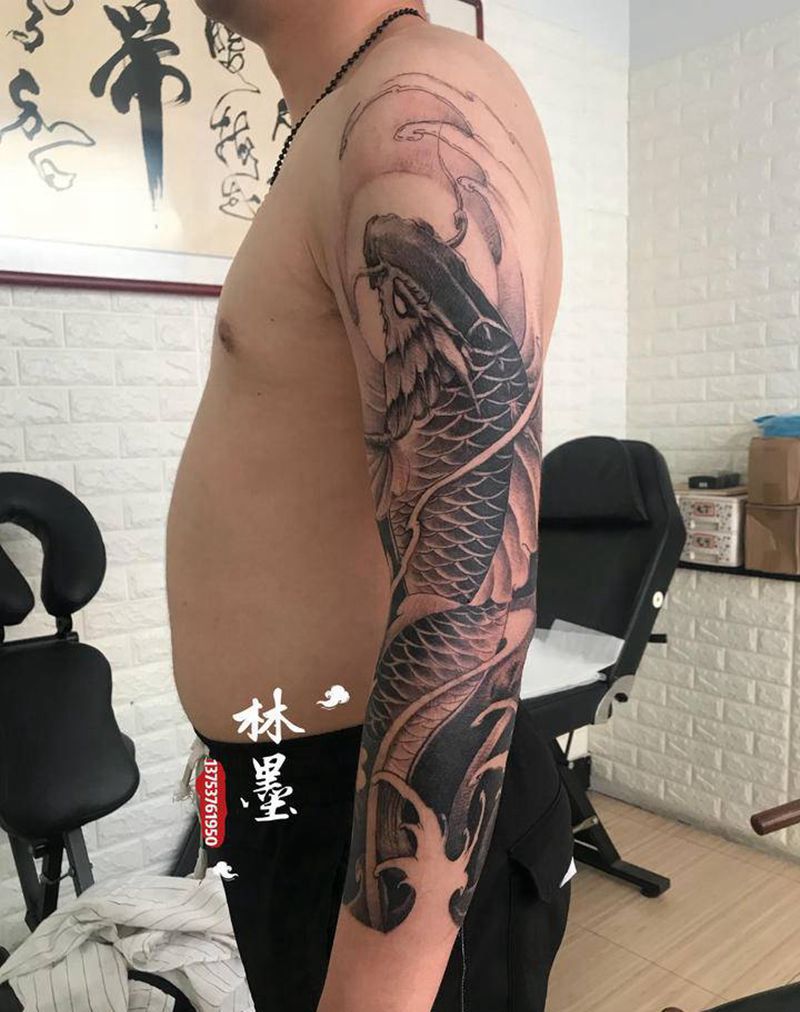 七分花臂纹身图片_手臂新传统纹身图案