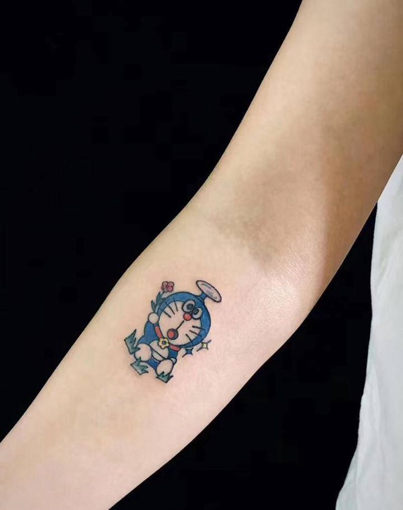 哆啦梦纹身图片_手臂纹身图案