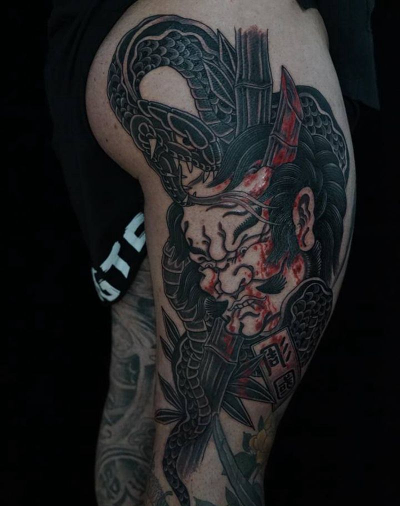 生首作品纹身图片_腿部老传统纹身图案