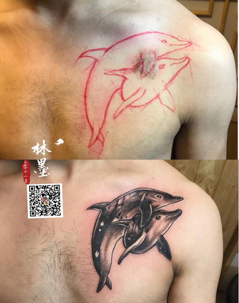 海豚纹身图片_胸部新传统纹身图案