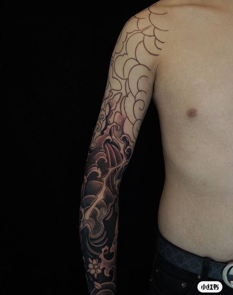 浪花花臂纹身图片_手臂手部纹身图案