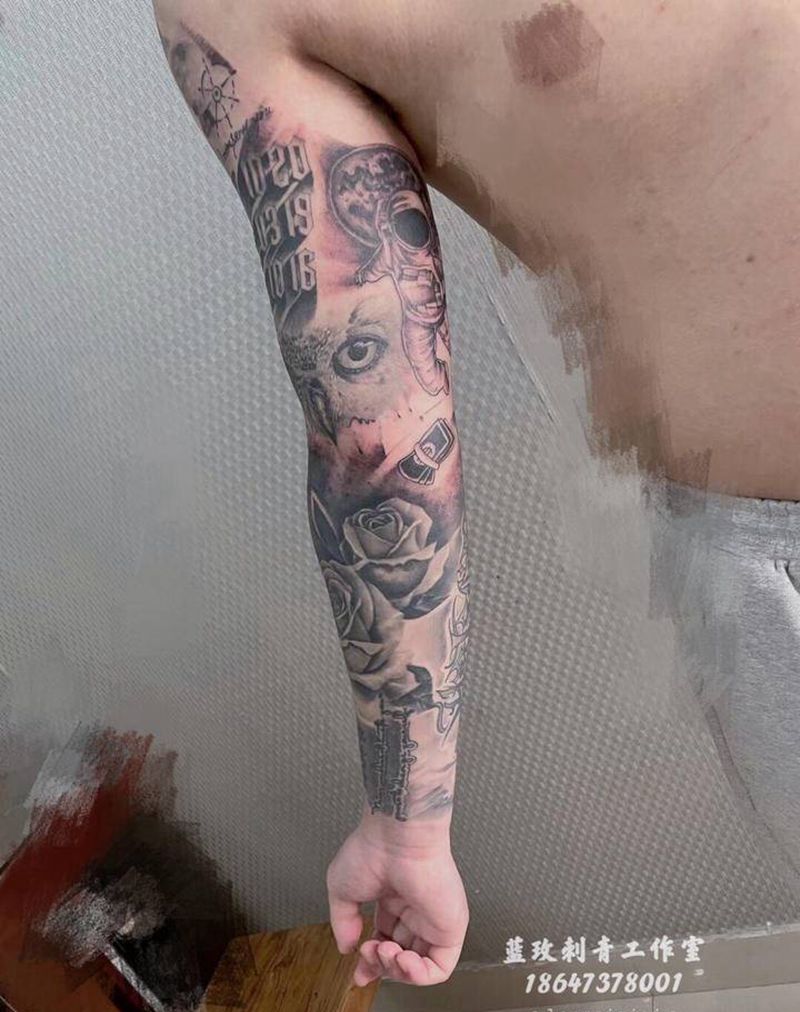花臂纹身图片_手臂欧美写实纹身图案