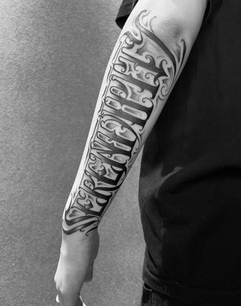 小臂外侧花体字纹身图片_花体字纹身图案