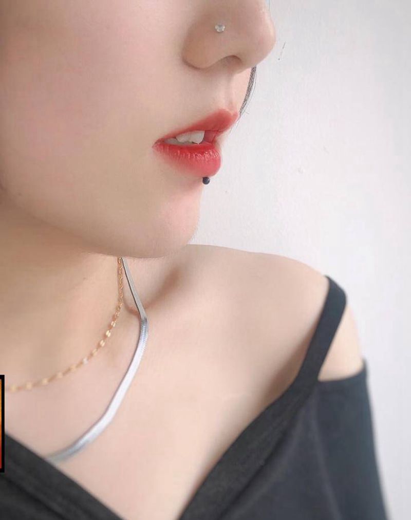 穿孔唇钉鼻钉纹身图片_穿孔纹身图案