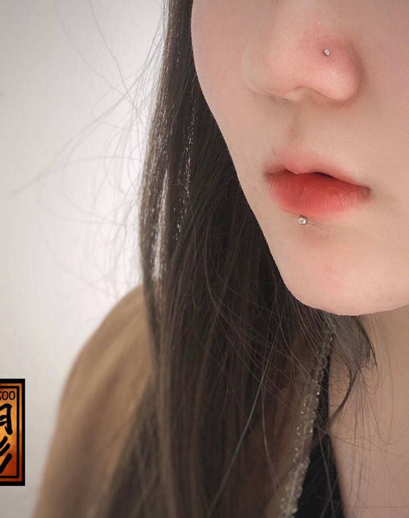 穿孔鼻钉唇钉纹身图片_穿孔纹身图案