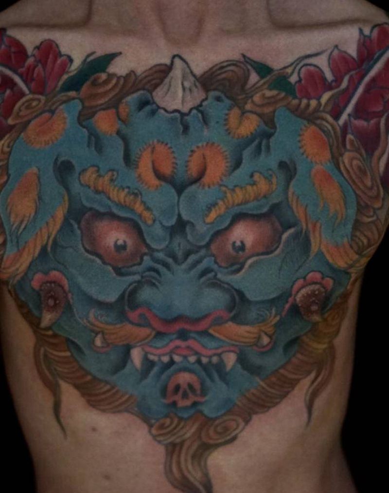 花胸唐狮子纹身图片_胸部纹身图案