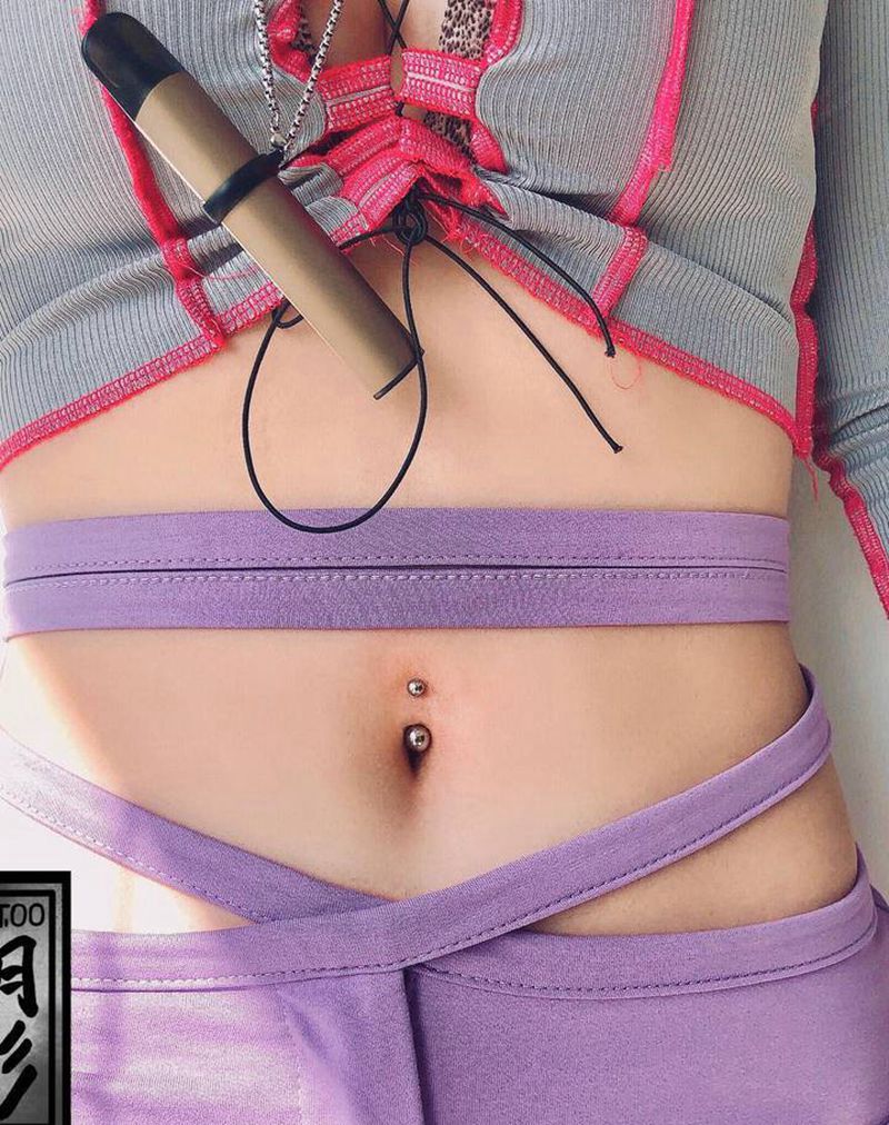 穿孔脐钉纹身图片_穿孔纹身图案