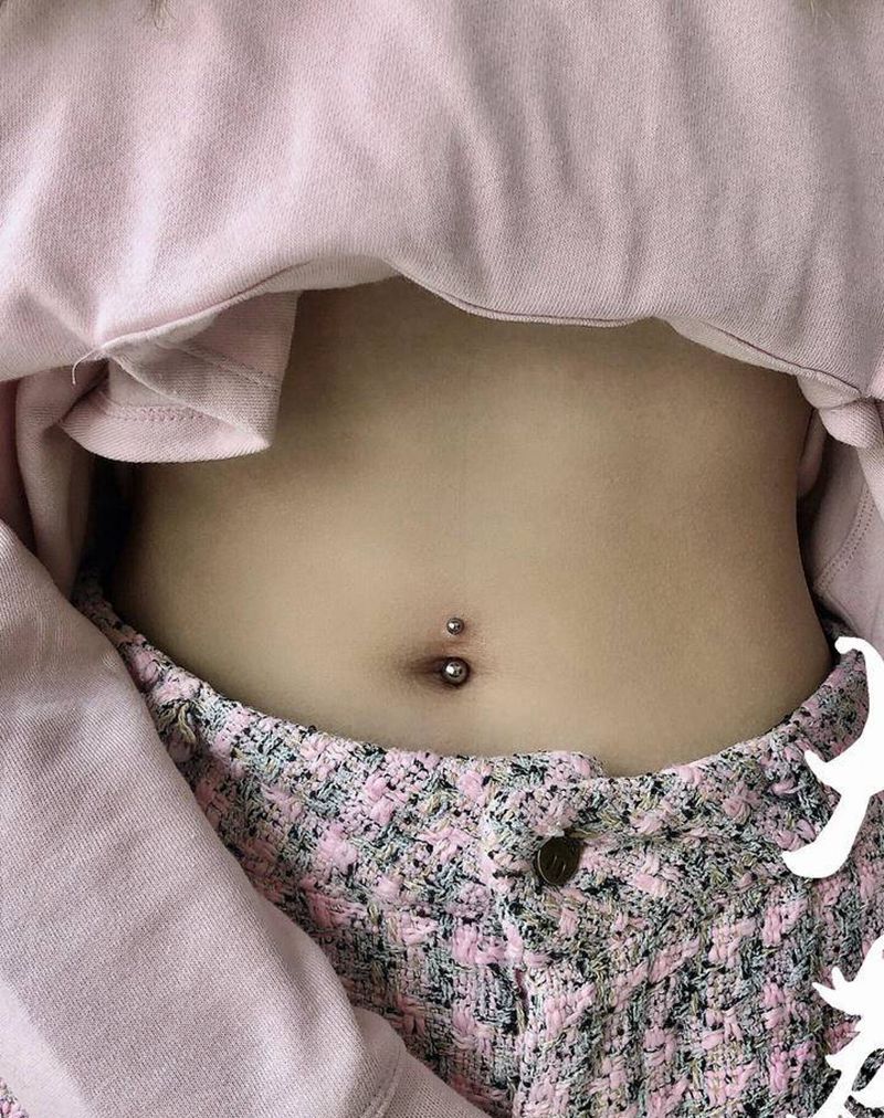 穿孔脐钉纹身图片_穿孔纹身图案