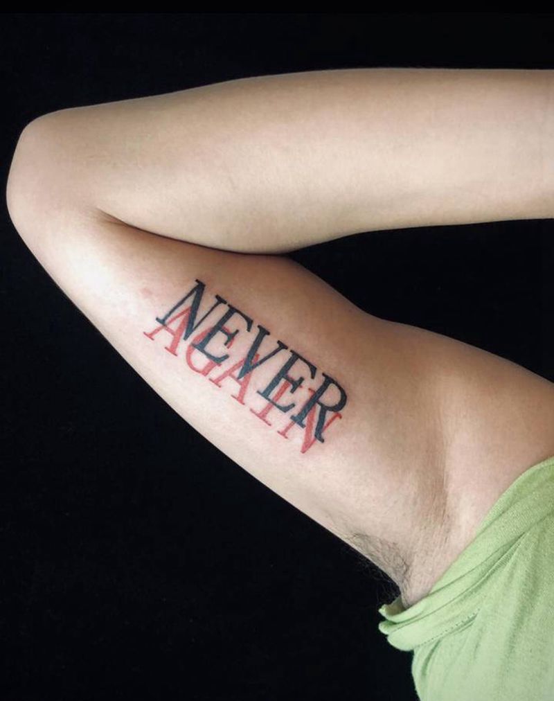 绝不重来纹身图片_手臂纹身图案