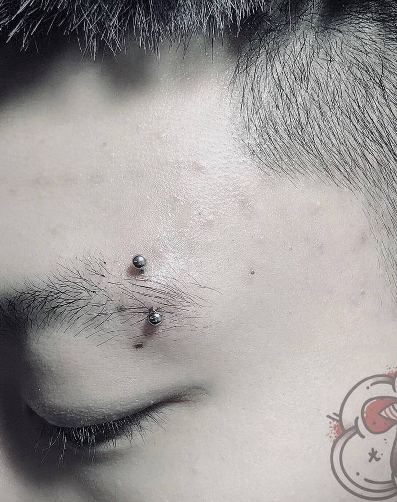 眉钉纹身图片_穿孔纹身图案