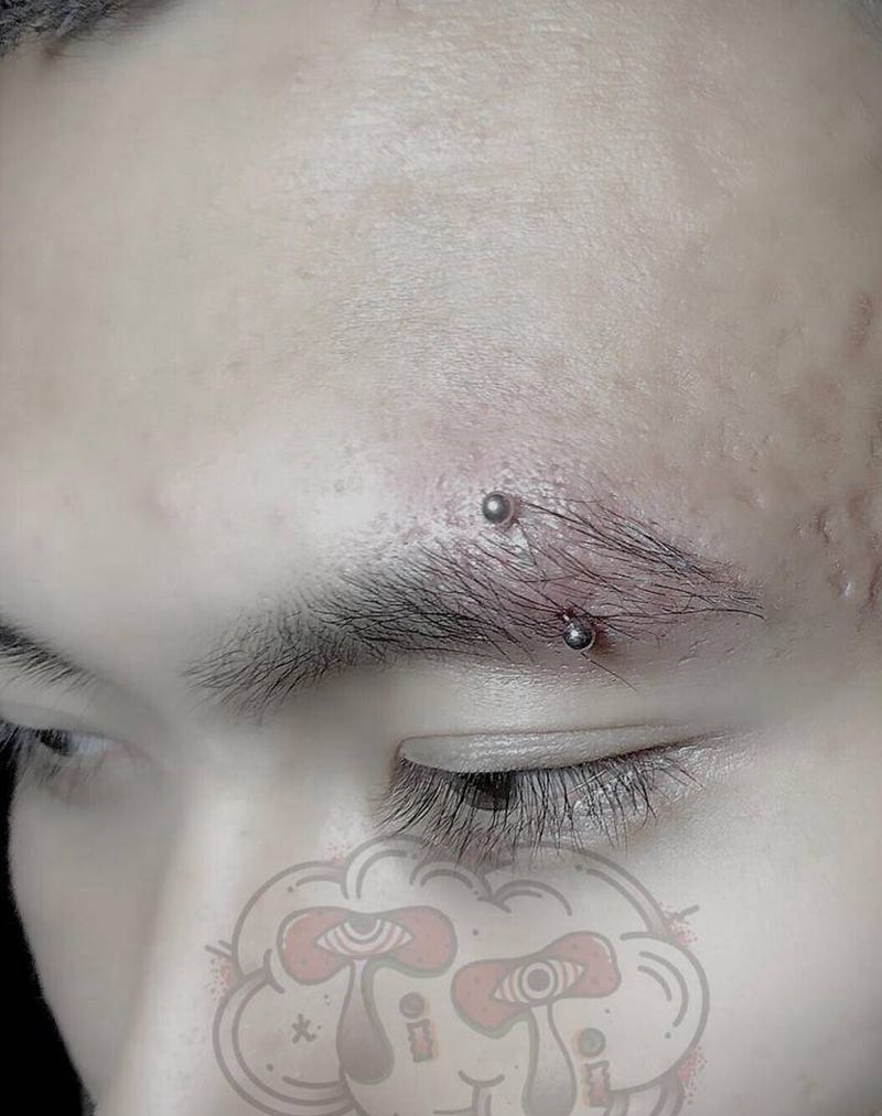 眉钉纹身图片_穿孔纹身图案