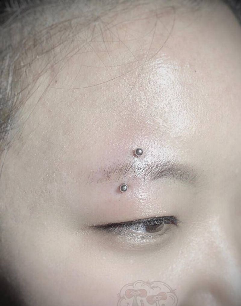 眉钉纹身图片_穿孔纹身图案