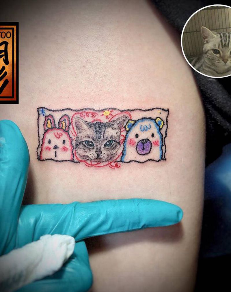 猫咪纹身图片_腿部纹身图案