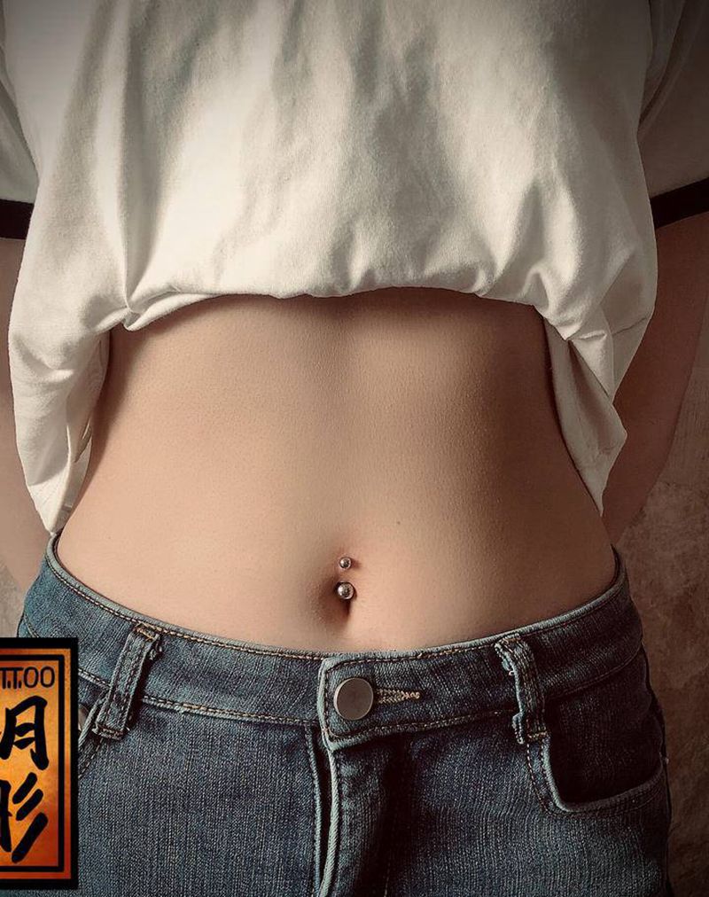 脐钉纹身图片_穿孔纹身图案