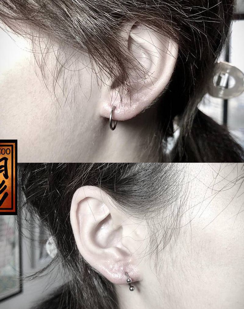 穿孔耳钉纹身图片_穿孔纹身图案