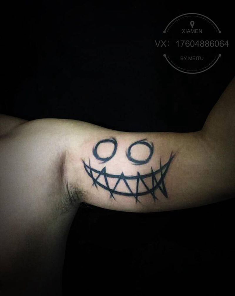 鬼脸纹身图片_手臂脚部水墨图腾纹身图案
