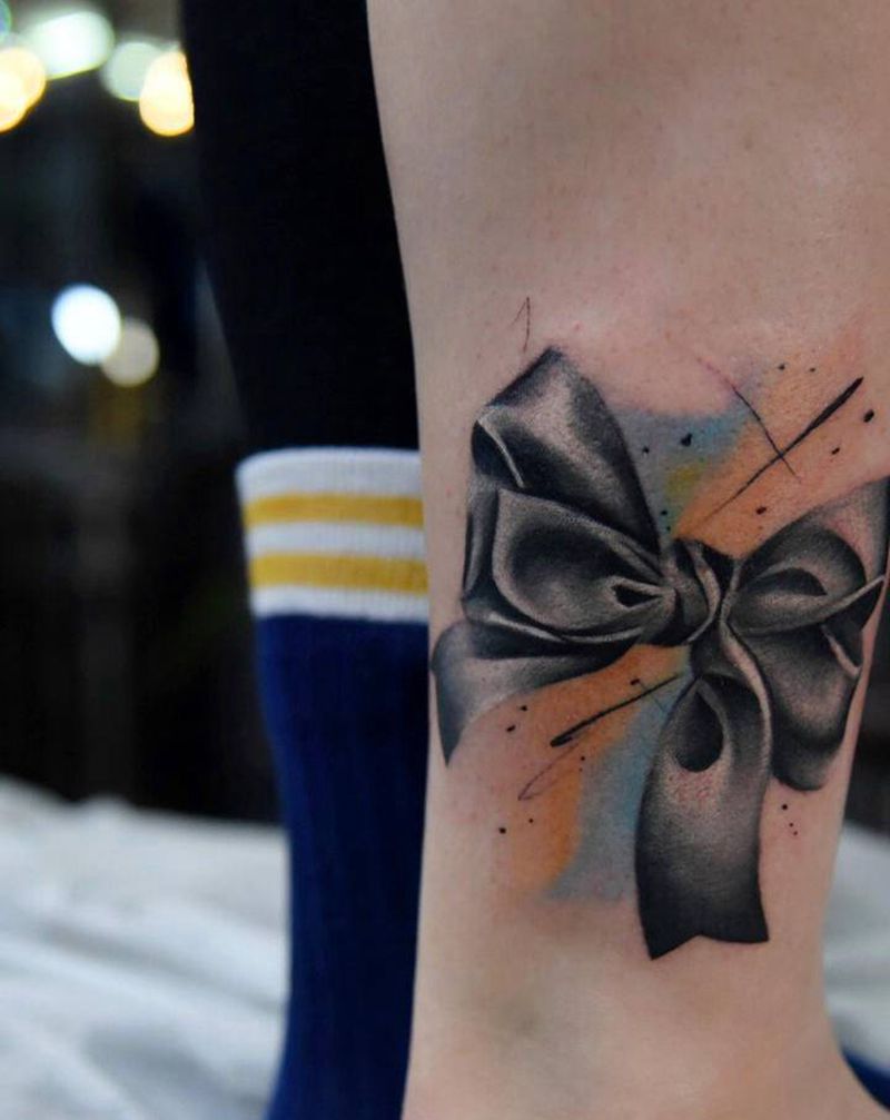 水彩蝴蝶结纹身图片_腿部水彩水墨纹身图案