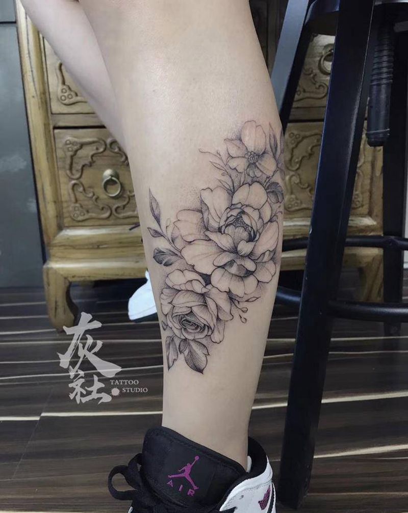 素花纹身图片_腿部点刺素花纹身图案