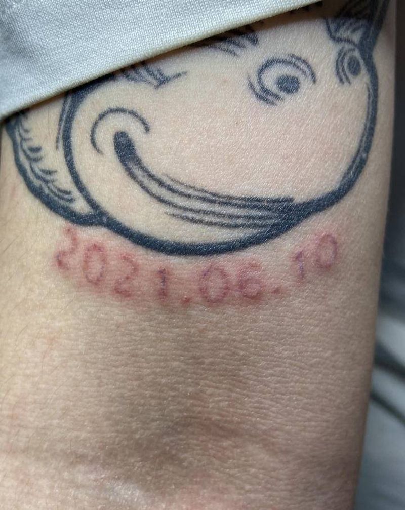 隐形纹身纹身图片_手臂花体字纹身图案