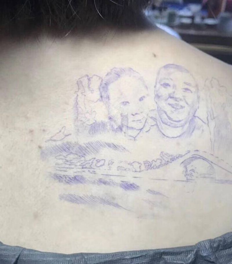 父爱纹身图片_背部欧美写实纹身图案