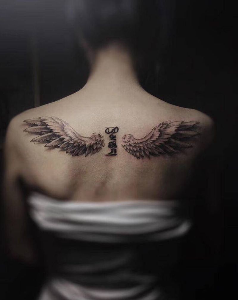 翅膀纹身图片_背部New School纹身图案