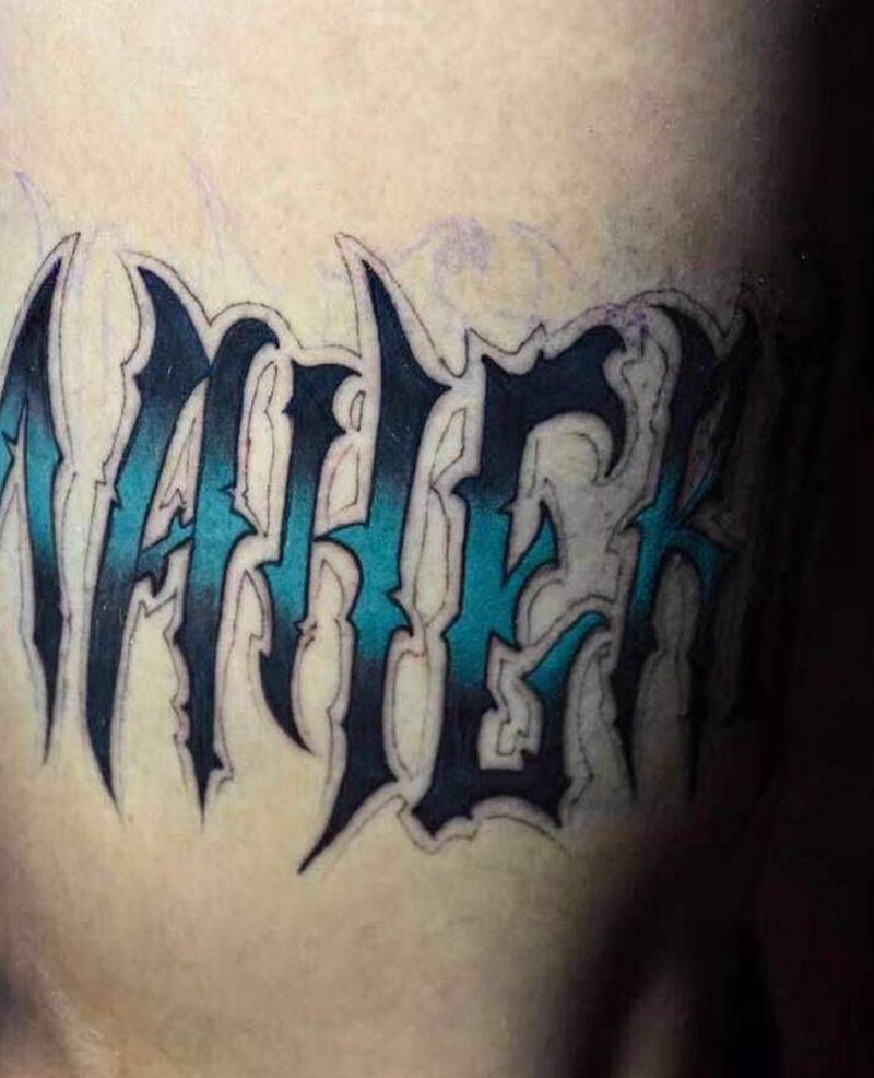 字母纹身图片_腿部水彩纹身图案