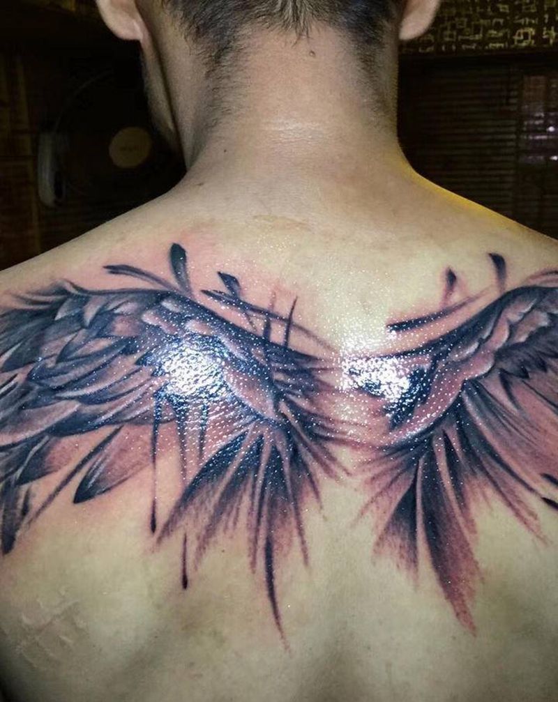 刺尊堂纹身-翅膀纹身图片_背部水墨新传统纹身图案