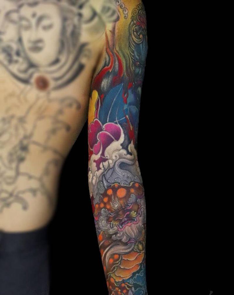 唐狮花臂纹身图片_手臂新传统唐狮修改不动明王纹身图案