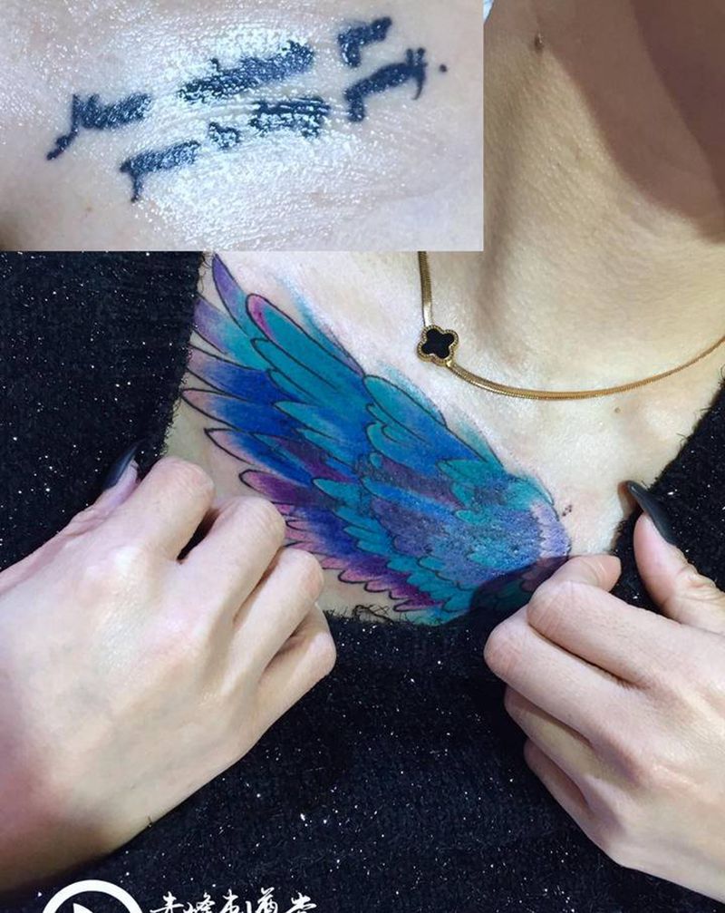 赤峰刺尊堂-羽翼纹身图片_胸部水彩纹身图案