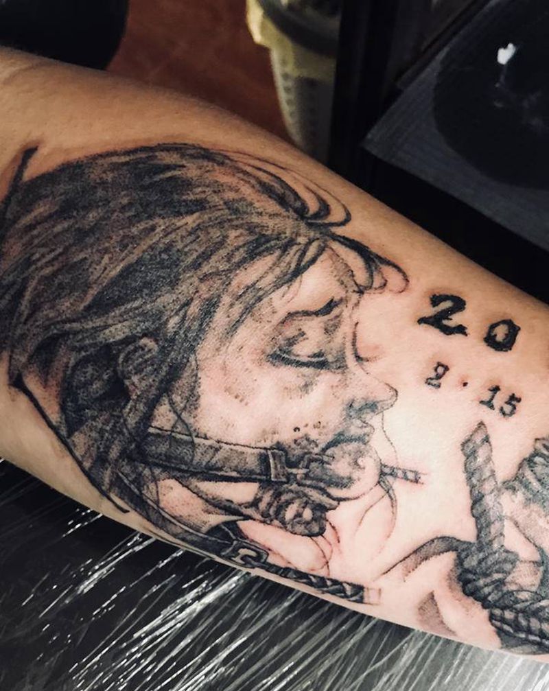 SM纹身图片_手臂点刺人像SM纹身图案