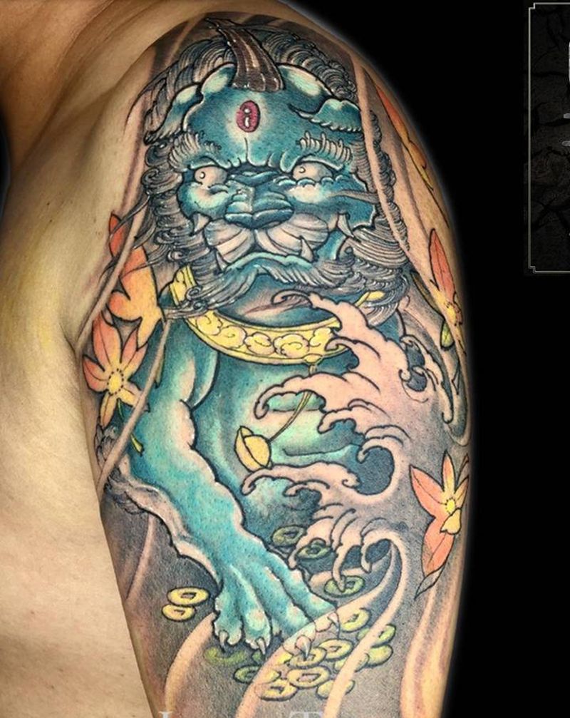 大臂唐狮纹身图片_手臂新传统唐狮纹身图案