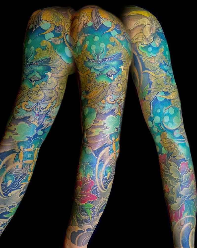 遮盖作品 -唐狮花臂纹身图片_手臂新传统唐狮牡丹纹身图案