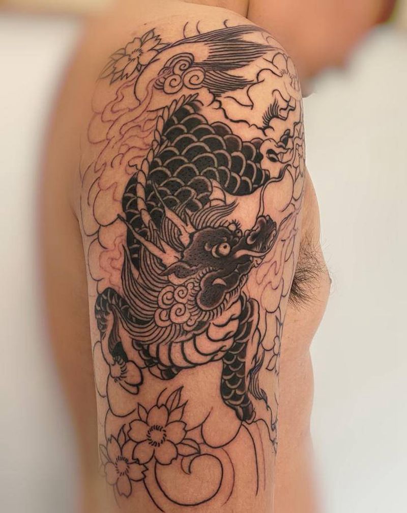 老传统麒麟纹身图片_手臂老传统麒麟大臂老传统纹身图案