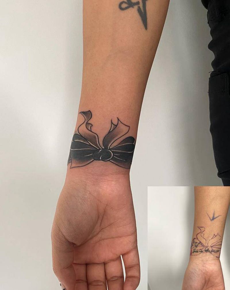 遮盖作品纹身图片_手臂新传统遮盖蝴蝶结纹身图案