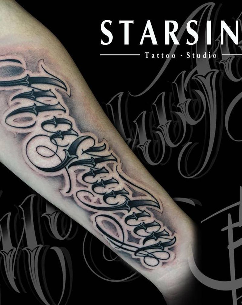 Chicano纹身图片_手臂花体字奇卡诺纹身图案