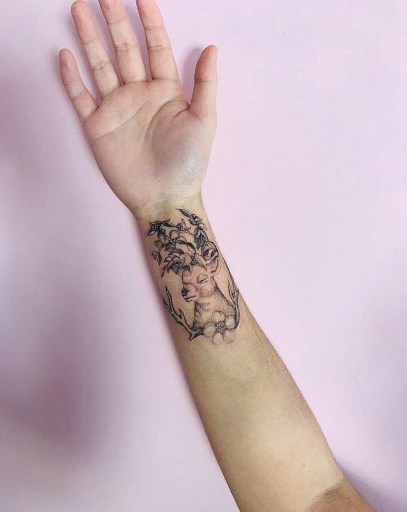 鹿头纹身图片_手臂欧美写实点刺纹身图案